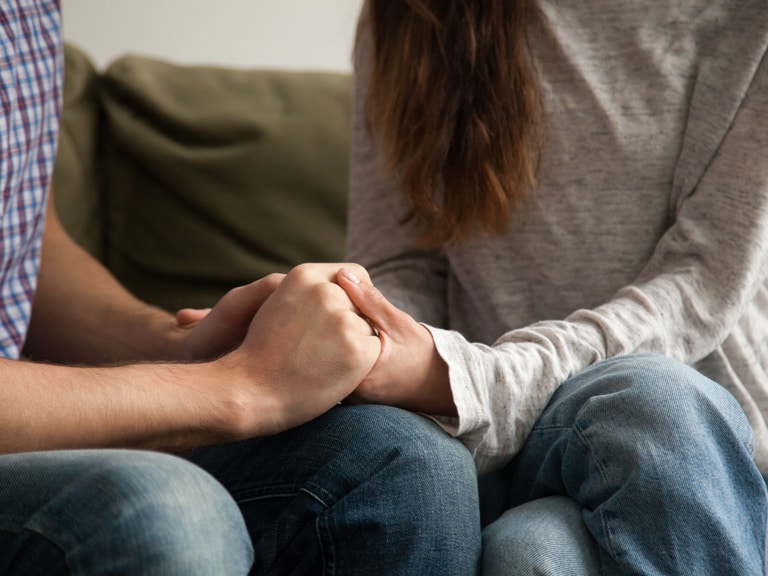 Holding Hands After Couples Counseling Session in San Diego, CA